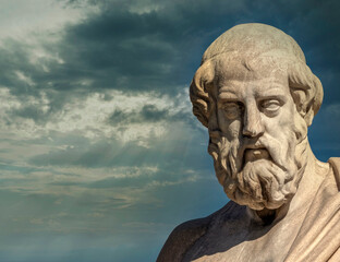 Plato the ancient Greek philosopher and thinker under dramatic sky, Athens Greece