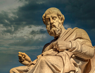 Plato the ancient Greek philosopher and thinker under dramatic sky, Athens Greece