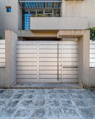 contemporary house front entrance white painted metallic door