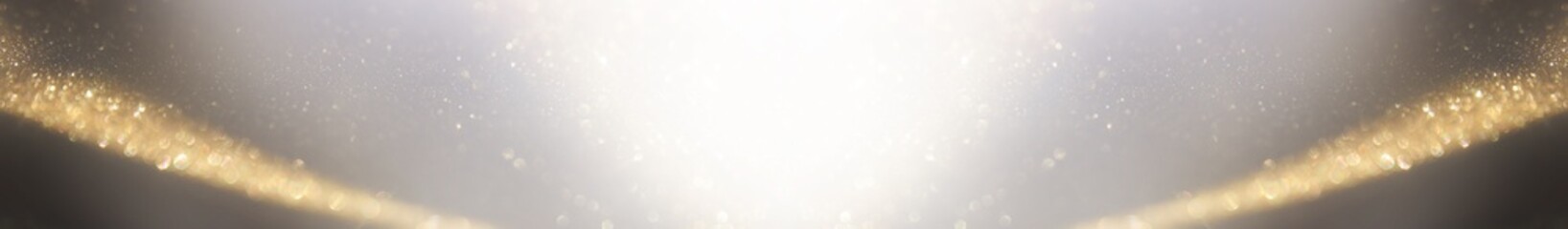 background of abstract gold and black glitter lights. defocused