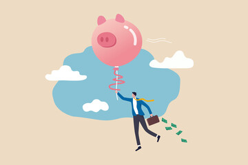 Financial freedom or financial independence concept, wealthy rich businessman floating high in the sky with piggy bank balloon.