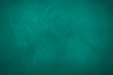 Texture of chalk on blank green blackboard or chalkboard background. School education, dark wall backdrop, template for learning board concept.