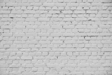 Obraz premium White brick wall, perfect as a background.