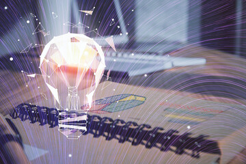 Obraz premium Double exposure of bulb drawing and desk with open notebook background. Concept of idea