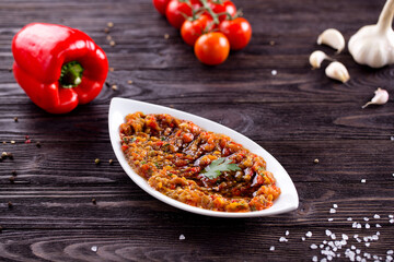 Assorted Middle Eastern and arabic dishes on a dark rustic background. Hummus, tabbouleh, pita, meat kebab, falafel, baklava. Halal food. Top view. Turkish foods, Turkish pizza, Turkish breakfast