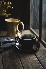 Cup of Coffee Next To Window