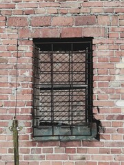Windows in old brick wall