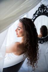 ukrainian good looking Woman looking to the side watching in the window