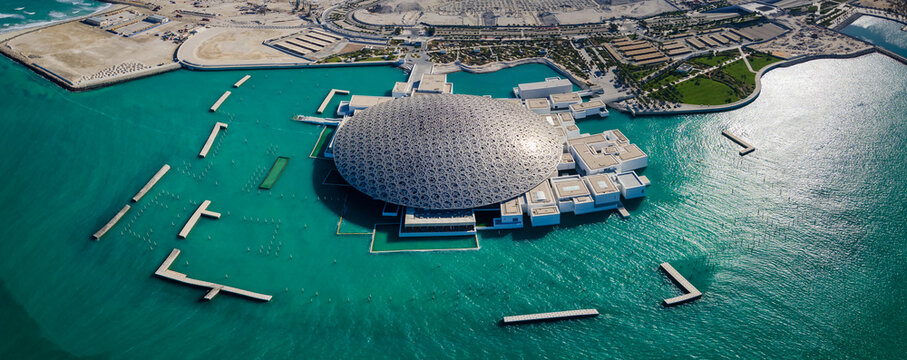 Abu Dhabi, United Arab Emirates - April 6, 2021: Louvre museum in Abu Dhabi emirate of UAE aerial view