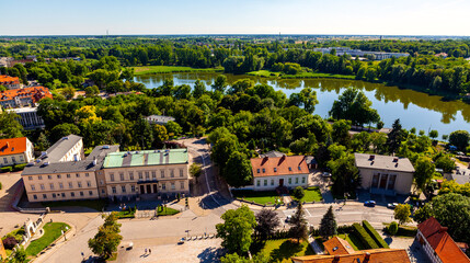 Panoramic aerial view of historic city center with Jezioro Jelonek Lake and Wzgorze Lecha Hill in Gniezno, Poland - obrazy, fototapety, plakaty