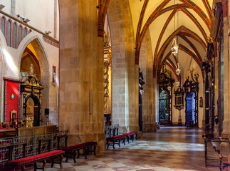 Gothic aisle of Gniezno Cathedral with symbolic sarcophagus and coffin of St. Adalbert, Sw. Wojciech, martyr in old town Lech Hill historic city center of Gniezno, Poland - obrazy, fototapety, plakaty