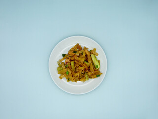 Udon noodles with teriyaki sauce, with vegetables (cucumber, sweet pepper) and sesame seeds