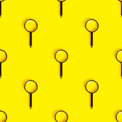 Magnifying glass repeat seamless pattern on light yellow background.