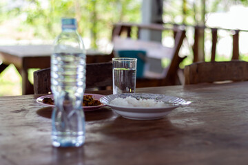 A glass of water on the dining table