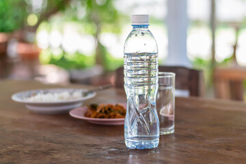 A bottle of drinking water on the table