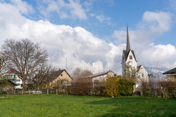 idyllic country village landscape and church in the Swiss Alps near Bad Ragaz