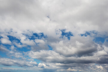 Obraz premium Blue cloudy sky. Nature background. Wallpaper.