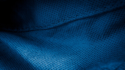pleated blue cotton material. texture or background