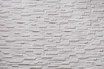 Background texture of white narrow bricks. masonry. copy space. 
