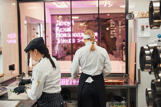 Hard-working chefs preparing meals in the kitchen