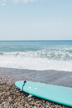 surfboard with sea in the background