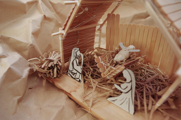 Obraz premium tokyo, japan, 22-09-2020, Traditional christmas pappresentation of the Jesus Nativity handmade with ice cream sticks.