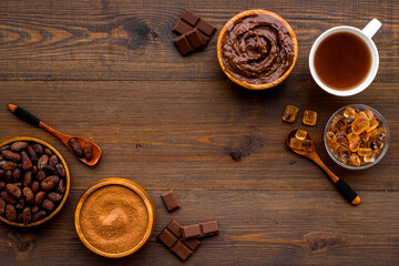 Coffee and cocoa beans and ground powder with hot chocolate drink