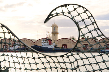 Fototapeta premium Big boats in the port of the city of Gandia in Spain during tranquil evening.