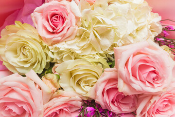 bouquet of flowers on pink background  - image