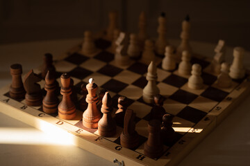 chess pieces on the board in beautiful light