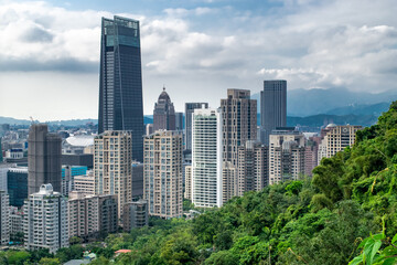 Fototapeta na wymiar Taipei Cityscape: Modern Skyline of Taipei, as seen from Mountain Park Overlook - Taipei, Taiwan