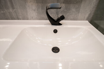 White sink with black matte bathroom sink