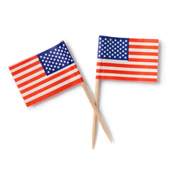 Pair of miniature American flag cocktail sticks isolated on white background close up 