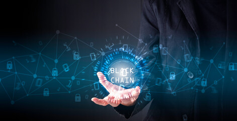 Blockchain technology concept, Blockchain text in technology circle on businessman hand, Binary code with connect digital technology line blue background.