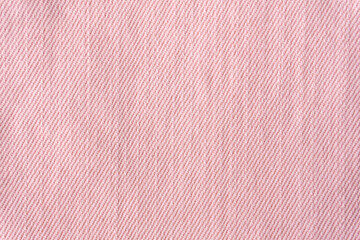 Fototapeta premium Light pink denim jeans textured background