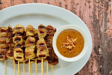 Indonesian chicken satay or Sate Ayam. Served with peanut sauce
