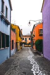 Fototapeta na wymiar Colourful houses and narrow street in the old town