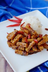 Tempe sweet soy sauce with steamed white rice and chili