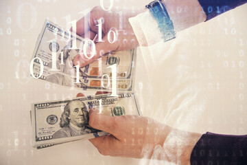 Multi exposure of technology drawing hologram and us dollars bills and man hands. Data concept