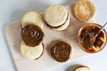 Alfahores cookies with condensed milk. Traditional homemade biscuits. Homemade food concept. Horizontal orientation. Top view.