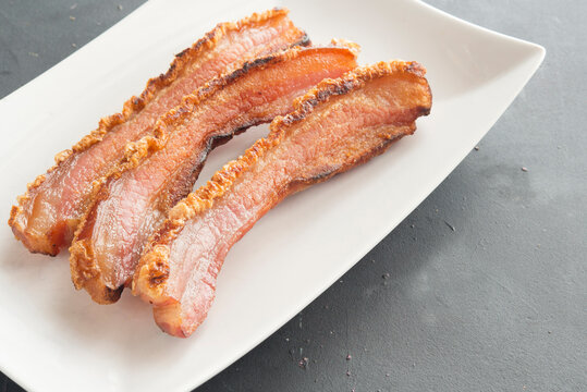 slice of bacon on plate
