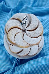 Indonesian Idul Fitri special offerings : Putri Salju or Snow White Cookies. Which is crescent-shaped and coated with powdered sugar 