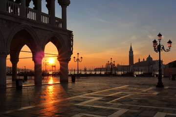 Piazza San Marco and waterfront promenade at sunrise in Venice, Italy