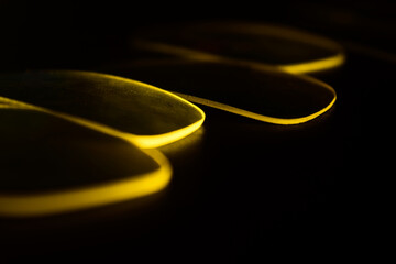 Glass pieces with yellow lights 