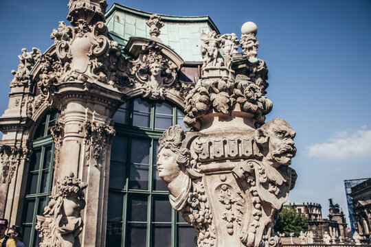 17 May 2019 Dresden, Germany - Sculptures, bas reliefs and architectural details of Zwinger Palace.