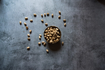Top view of pistachios in a bowl with use of selective focus 