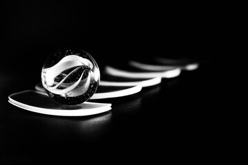 Marble ball on glass surface 