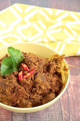Beef Rendang or spicy beef stew. The popular dish from West Sumatran, Indonesia 