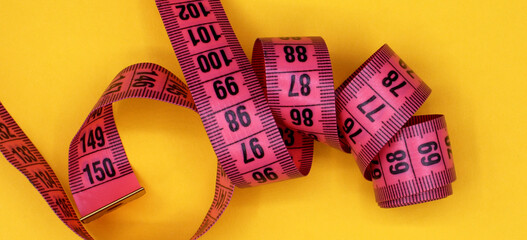 tape measure on a colorful  background
