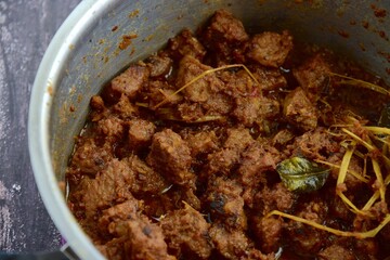 Beef Rendang. Indonesian spicy beef stew in a pot